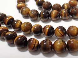  string of tigers eye 10mm round beads - approx 39 per strand 