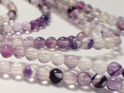  string of rainbow fluorite 4mm round beads - approx 98 per string 
