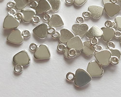  <15.0g/100> sterling silver, 7mm x 5mm x 0.75mm heart tag, ring at top has 1mm hole 