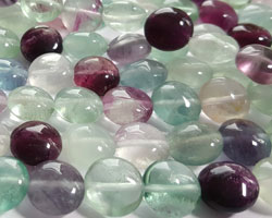  string of rainbow fluorite 10mm x 6mm polished puffed oval beads - approx 40 beads per strand - each stand contains good range of colours 