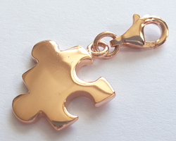  --CLEARANCE-- ROSE VERMEIL 17mm x 13mm jigsaw piece charm, inc 2mm internal diameter closed ring and detatchable 9mm lobster clasp which is stamped 925 [vermeil is gold plated sterling silver] 