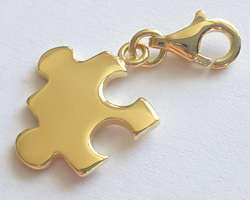  --CLEARANCE-- vermeil 17mm x 13mm jigsaw piece charm, inc 2mm internal diameter closed ring and detatchable 9mm lobster clasp which is stamped 925 [vermeil is gold plated sterling silver] 