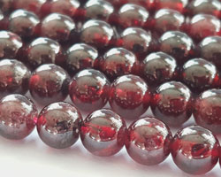  string of GRADE A garnet 6mm round beads - approx 65 beads per string 