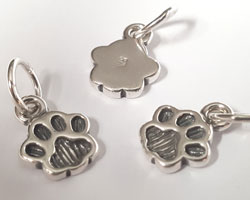  --CLEARANCE-- antiqued sterling silver, 12mm x 9mm pawprint charm with attached loop having 1.5mm internal diameter and also 7mm diameter closed jumpring, some are stamped 925 and some are not 