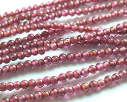  string of garnet 2mm round beads - approx 150 beads per string 