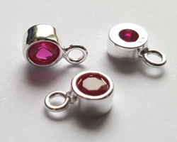  sterling silver, stamped 925, 8.35mm x 5.15mm drop / charm containing a 4mm fuchsia dark pink cubic zironia, very nicely made, has closed jumpring attached at the top with internal diameter of 1.5mm 