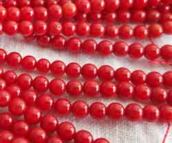  string of red coral 4mm round beads - approx 100 per strand 
