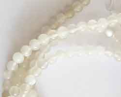  string of milky whites and pale greys  moonstone 4mm round beads approx 90 per string 