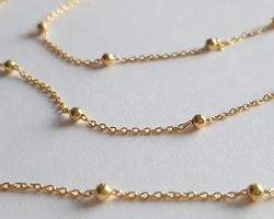 cm's - SOLD IN METRIC LENGTHS - vermeil loose forzantina chain - chain links are 0.8mm - balls / satellites are 2.5mm diameter, 25mm apart - chain weighs ~4.15g per meter, links accept a 0.5mm ring/wire [vermeil is gold plated sterling silver] 