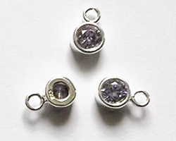  sterling silver, stamped 925, 8.35mm x 5.15mm drop / charm containing a 4mm violet cubic zironia, very nicely made, has closed jumpring attached at the top with internal diameter of 1.5mm 